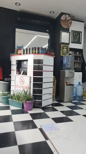 Volkan Tokmak Saç Tasarım ve Güzellik Merkezi